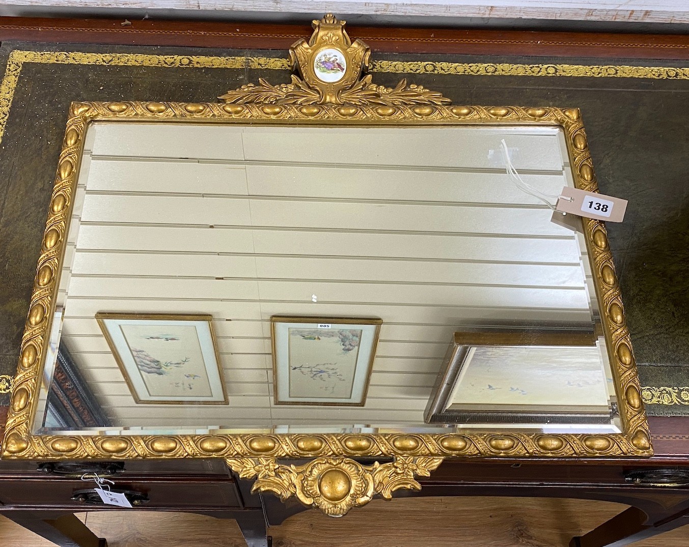 Two rectangular gilt framed wall mirrors, larger 62cm, height 88cm